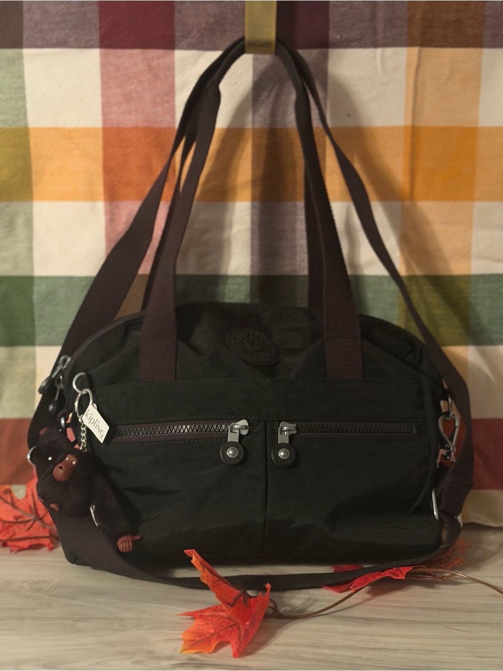 Kipling Black Duffel Bag with Dark Brown Straps